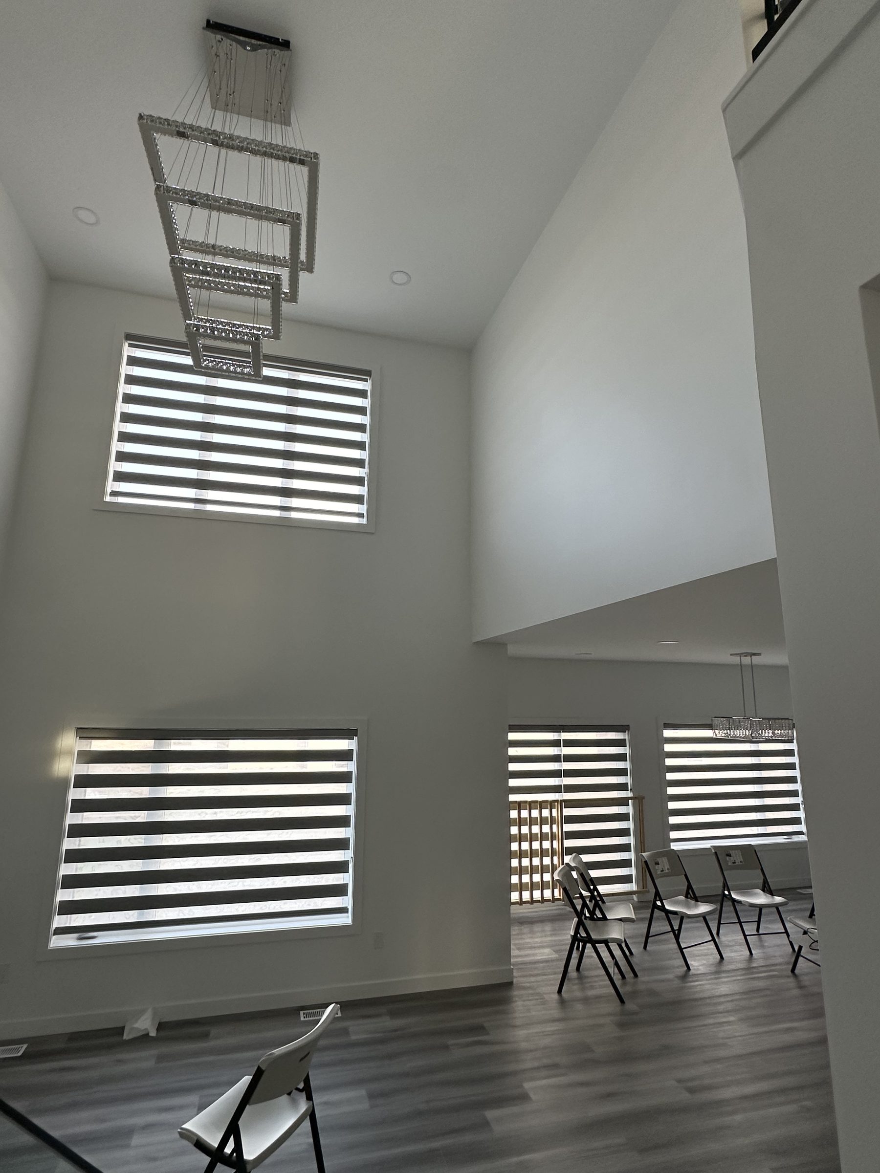 Living room with custom blinds – after